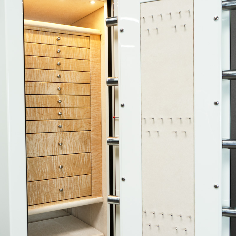 Drawers of Aaron - Emerald Luxury Jewelry Safe in White with 11 Curly Maple Drawers, featuring a necklace rack and shelfs for fine jewelry storage