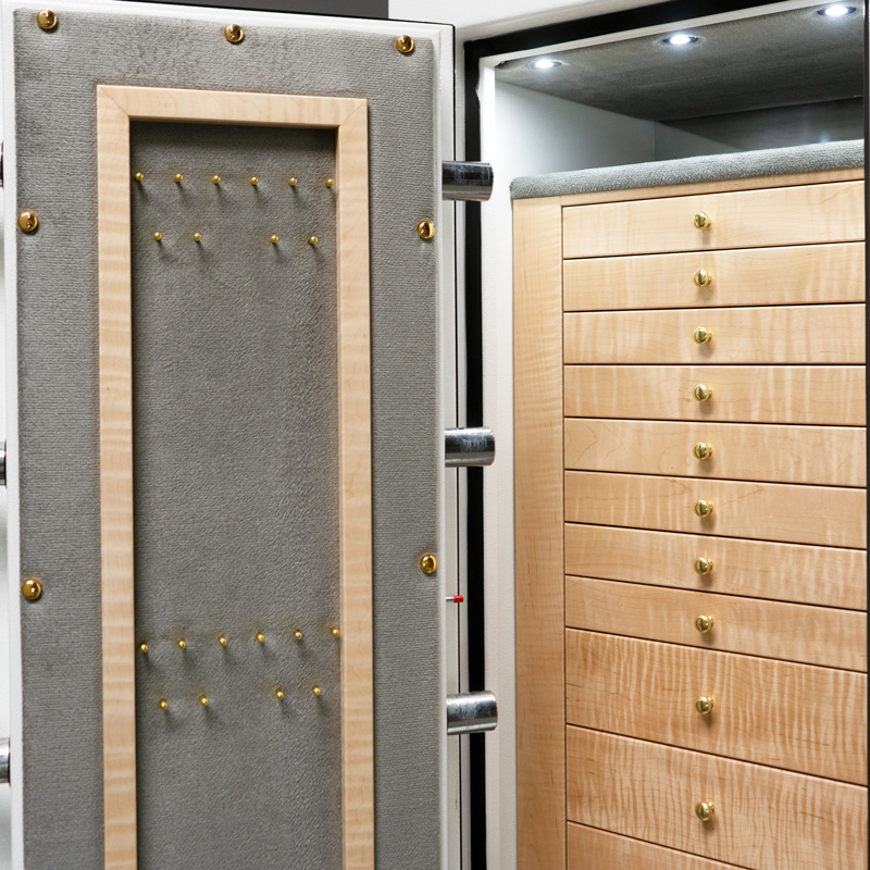 Interior Close Up of Door in C54 (left swing) in Textured White with Brass, 11 Drawers in Curly Maple, Necklace Panel