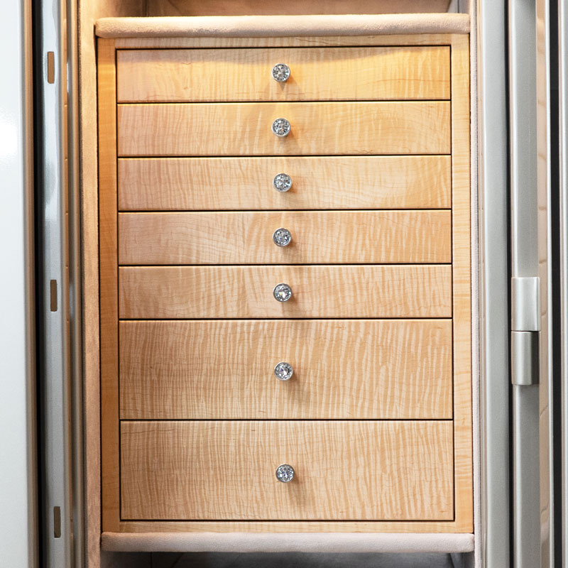 Front of Amethyst in Platinum High Gloss, 7 Curly Maple Drawers with Diamond Knobs, Necklace Rack, Satin Chrome Hardware, Champagne Microsuede